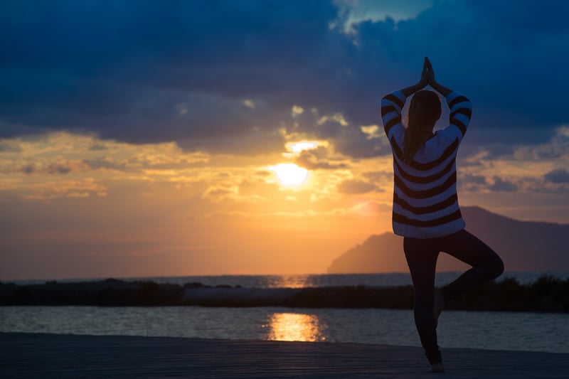 Yoga meditation at sunrise